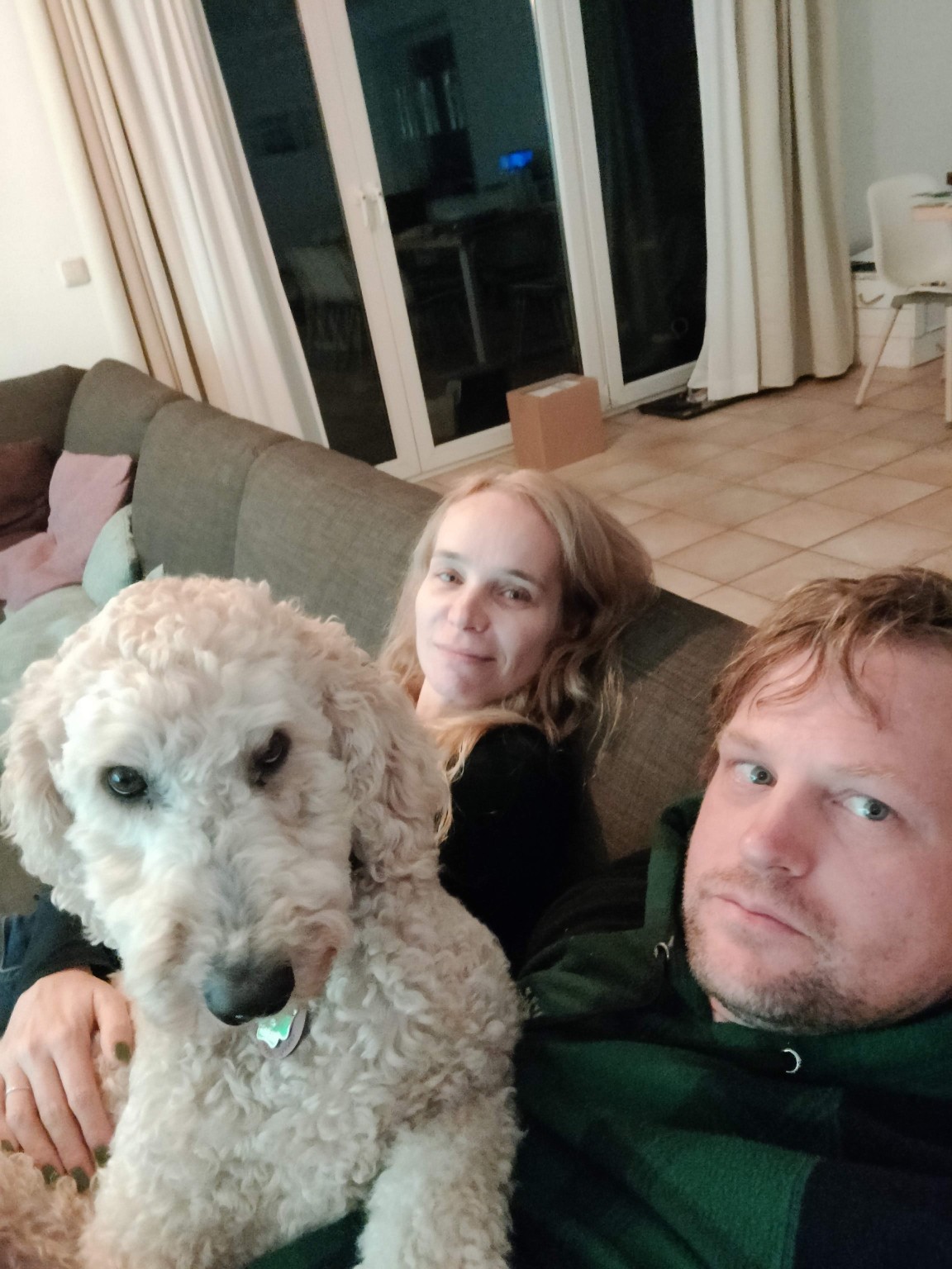 Tui relaxing on the sofa with Anja and Tony